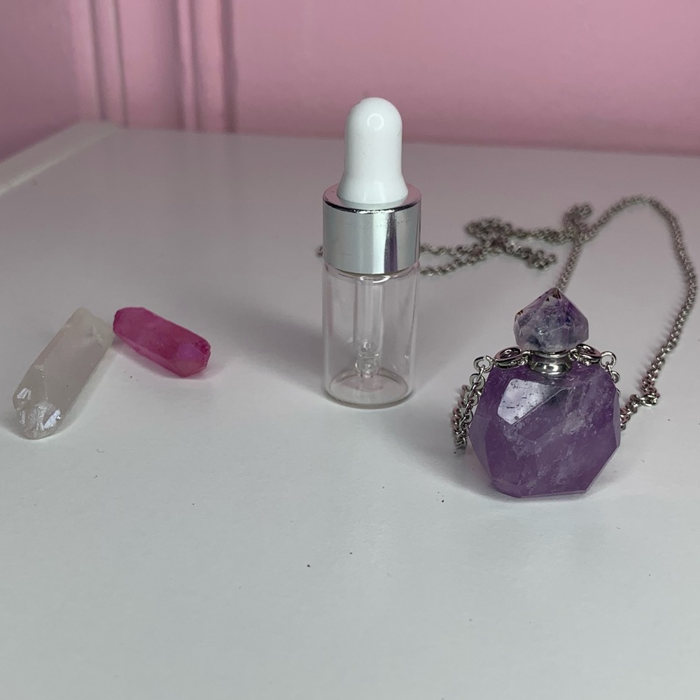 Amethyst crystal amulet necklace.  Silver plated.